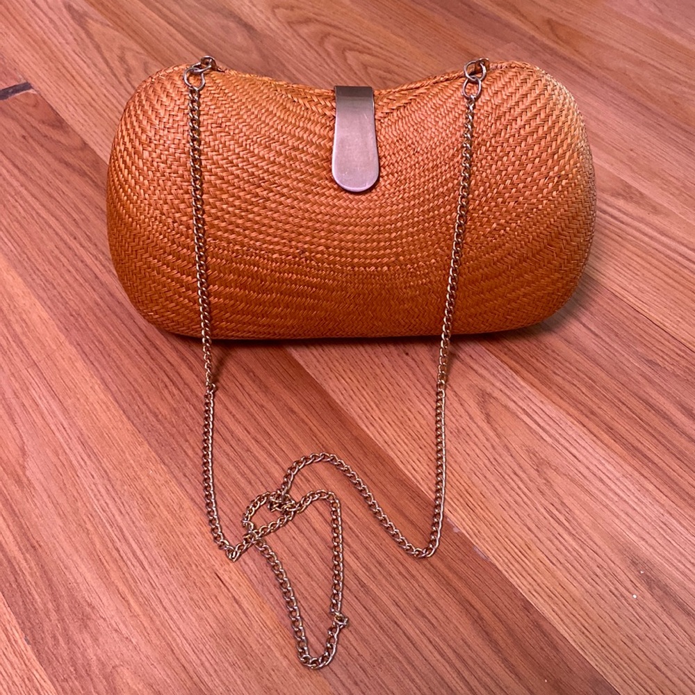 Woven shoulder and clutch bag.